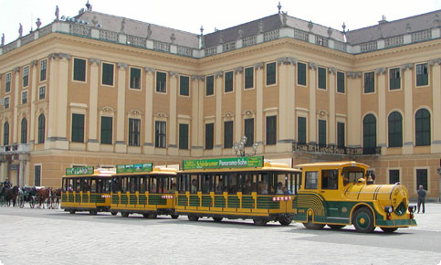 The panorama train in front of Schoenbrunn Palace