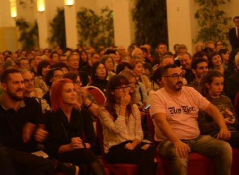 The audience listens to the classical music of the concert in the Schoenbrunn Orangery